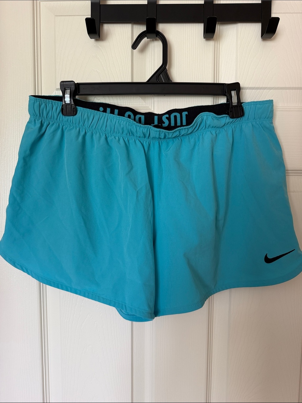 Nike Women's Teal Athletic Shorts with Black Logo